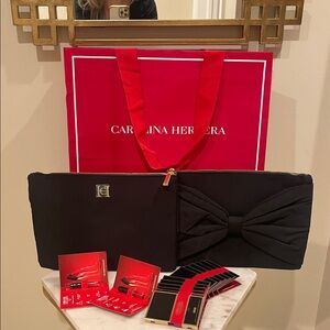 Carolina Herrera Black Cosmetic Bag with Bow Accent
